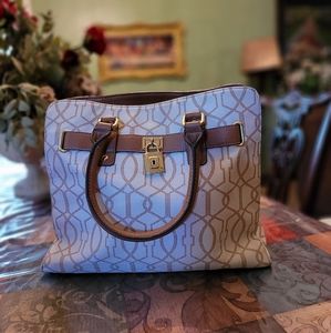 Purse with lock on front